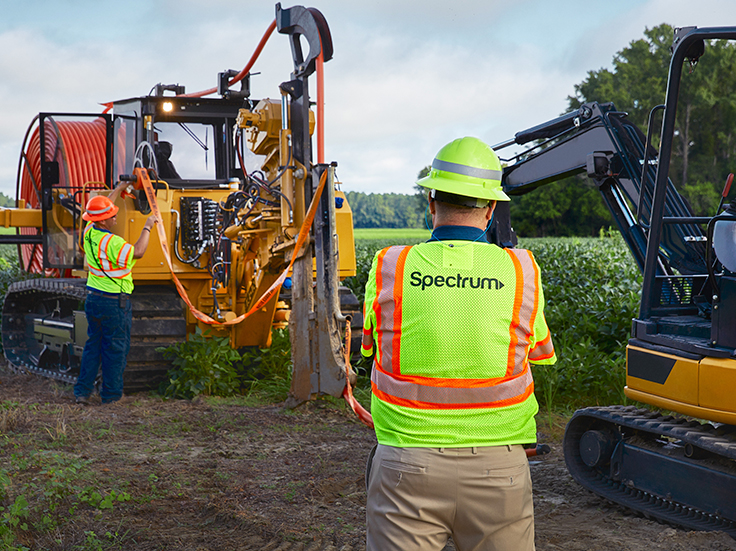 Spectrum underground construction crew working on a broadband expansion project