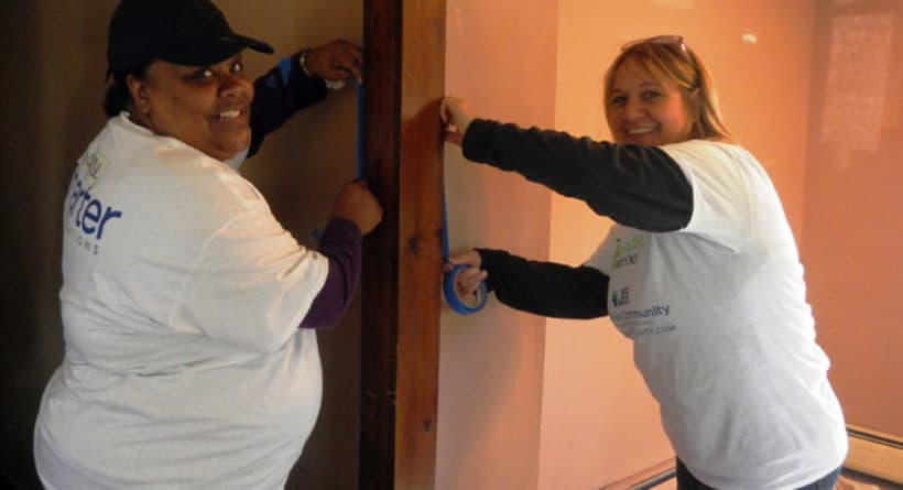 Charter our Community volunteers Dianne and Betsy prep the walls for painting at a Charter our Community-Rebuilding Together event in New Milford, Connecticut