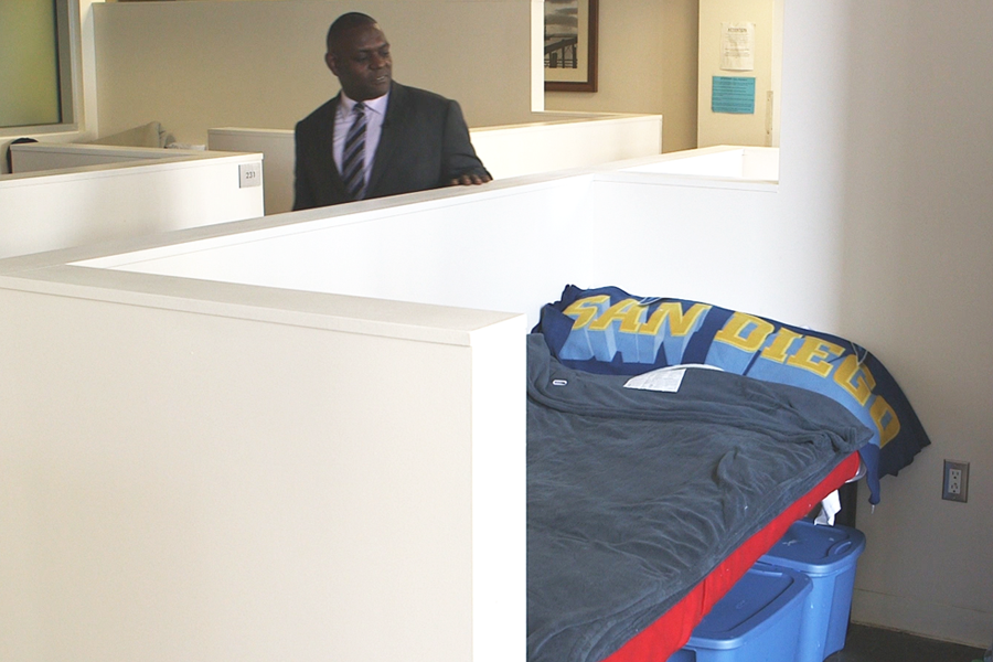 U.S. Navy Veteran Ivory Alexander visits his former bed in the PATH homeless shelter in San Diego, California.