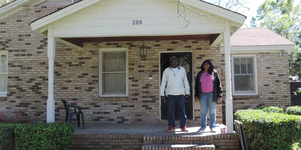 An image of Gloria and Victor Hibbler in front of their Selma home.
