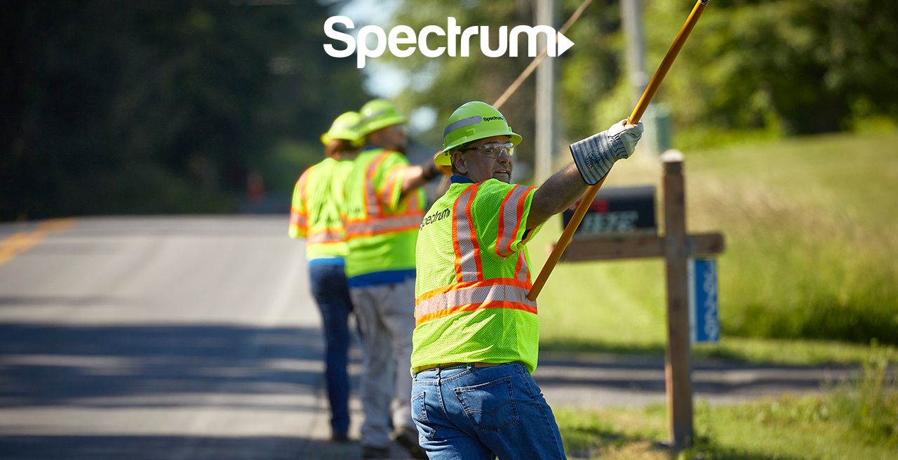 Spectrum technician crew working on broadband expansion project
