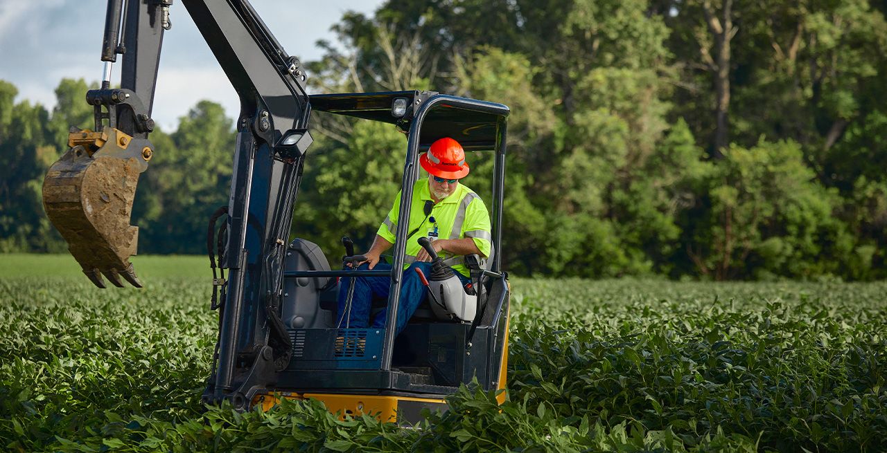 A Spectrum field technician working on a broadband expansion project