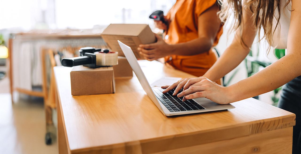 Small business owners working in their store  