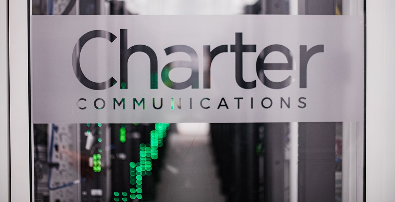 Charter logo on a glass door leading to a data center