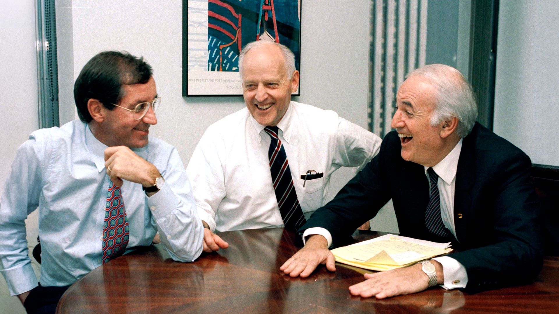 From left: Nicholas J. Nicholas Jr., Time Inc. president, J. Richard Munro, chairman and CEO of Time Inc., and  Steven Ross, chairman of Warner Communications, Inc., meet in New York to discuss a merger agreement.  Date: June 16, 1989. 