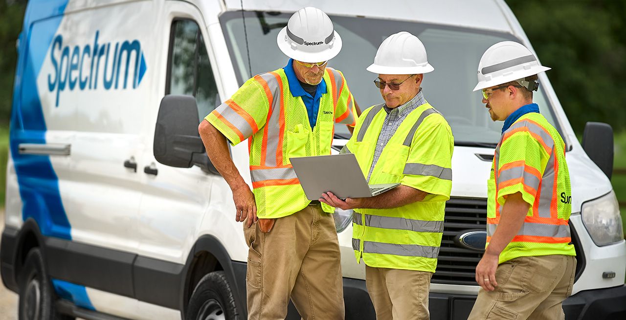 Spectrum technician crew working on a broadband expansion project