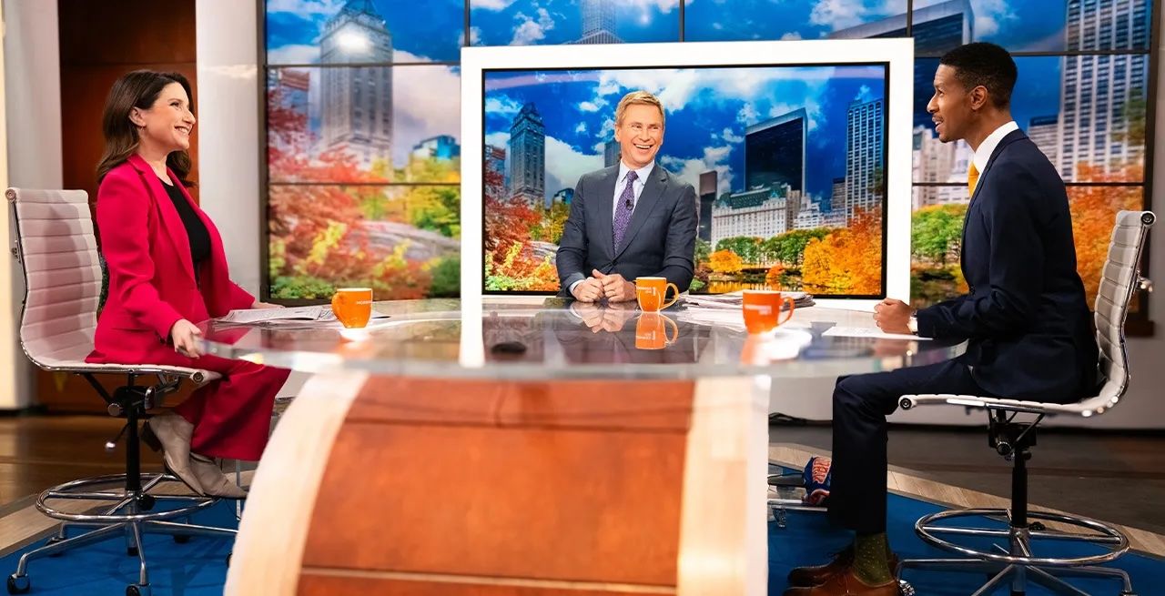 Spectrum News anchors on set