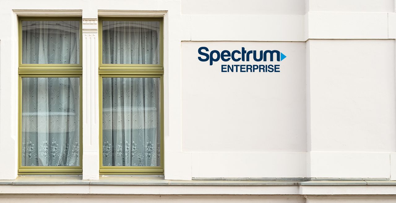 Hotel building with Spectrum Enterprise logo