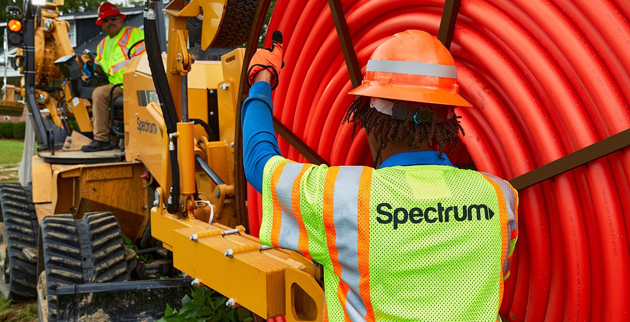 Spectrum technician crew working on a broadband expansion project