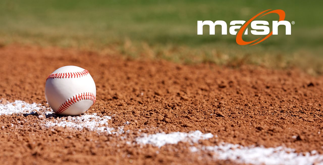 Baseball sitting on a foul line with MASN logo