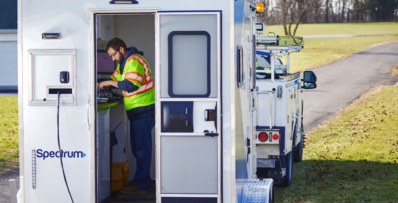 Spectrum technician crew working on a broadband expansion project