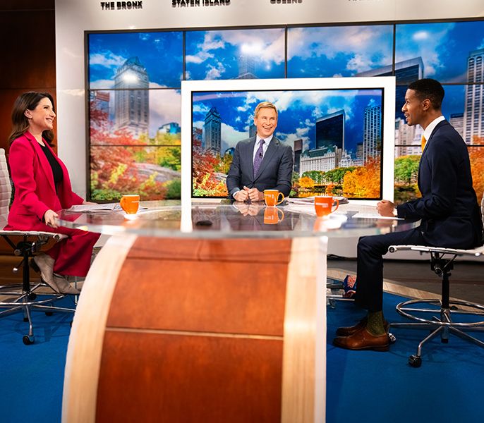 Spectrum News anchors in the studio