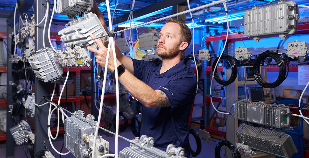 A technician working in Spectrum's CTEC facility