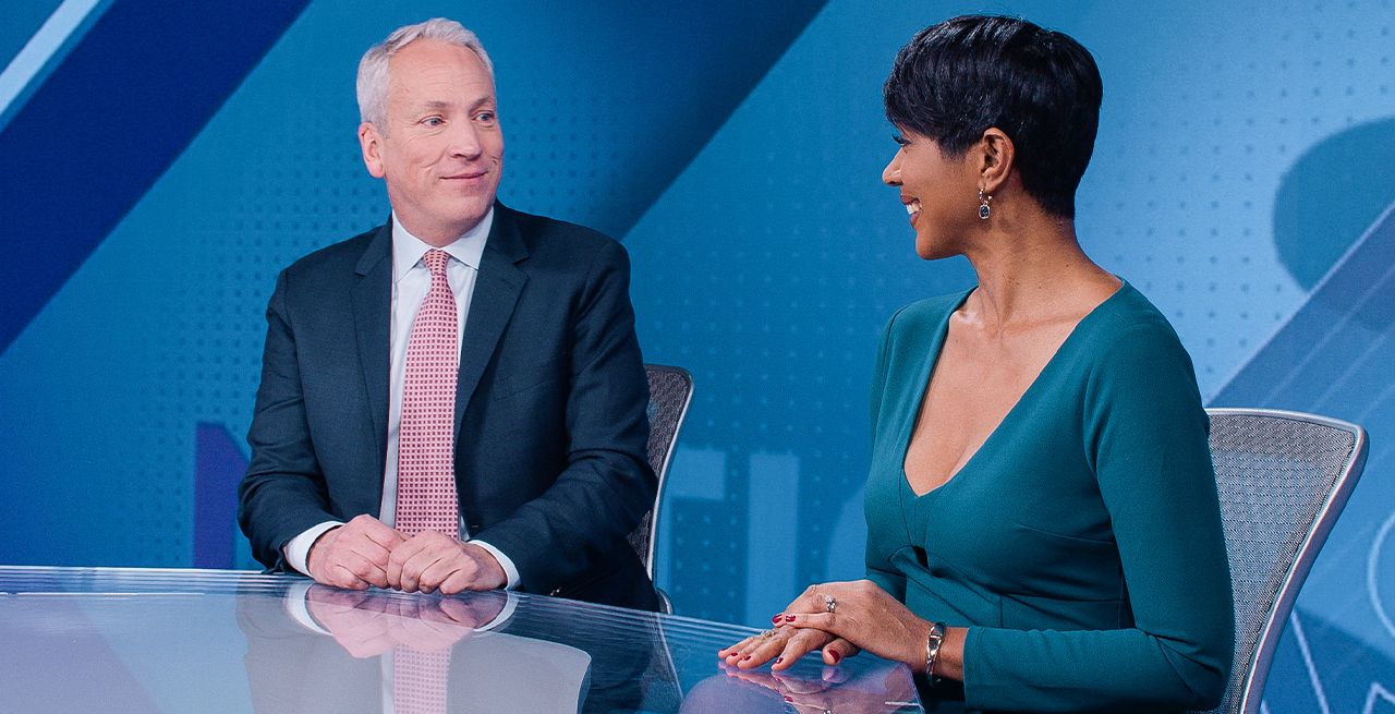 Two anchors on the anchor desk