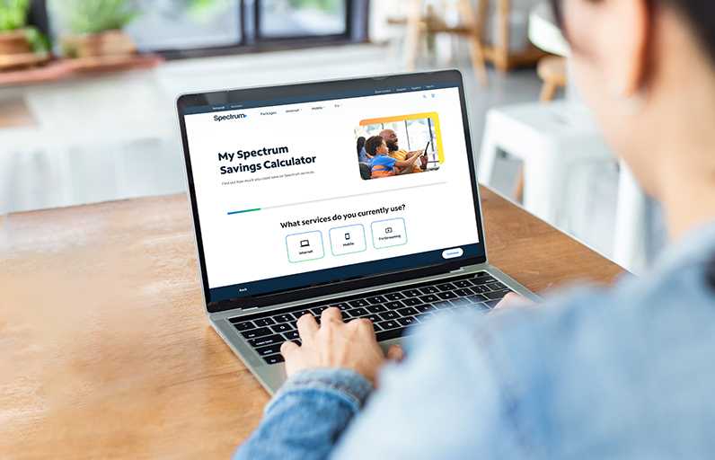 Spectrum Savings Calculator shown on a laptop 
