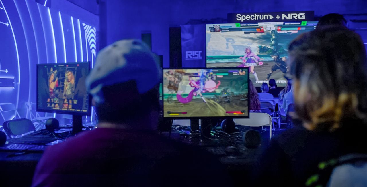 Gamers in a dark room, gaming