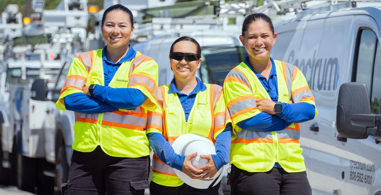 Three Spectrum maintenance technicians