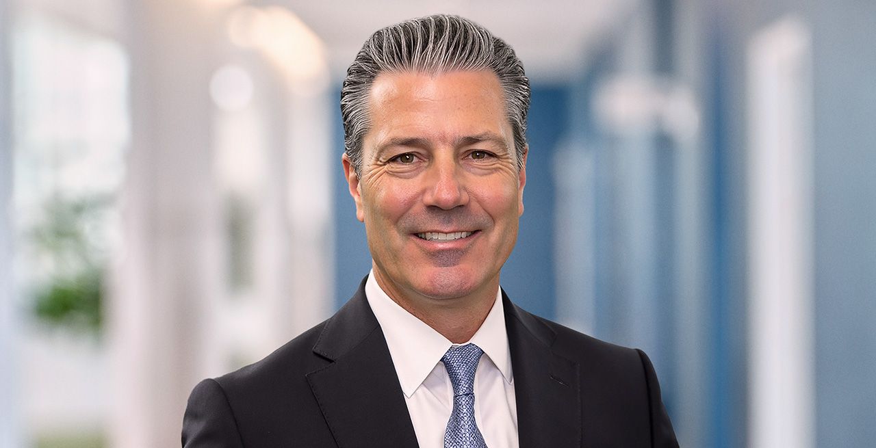 Image of a man in a corporate setting