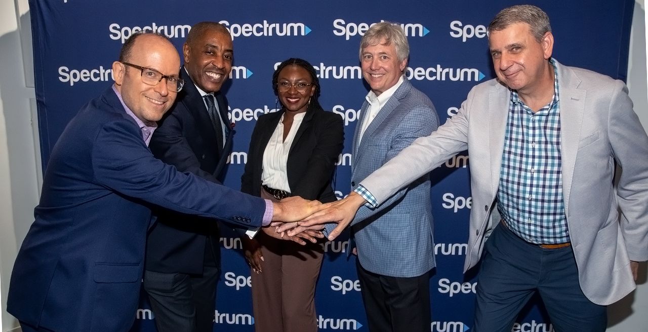 Spectrum officials gather for a special Small Business Week event 