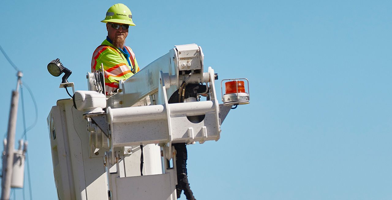 Spectrum technician crew working on a broadband expansion project