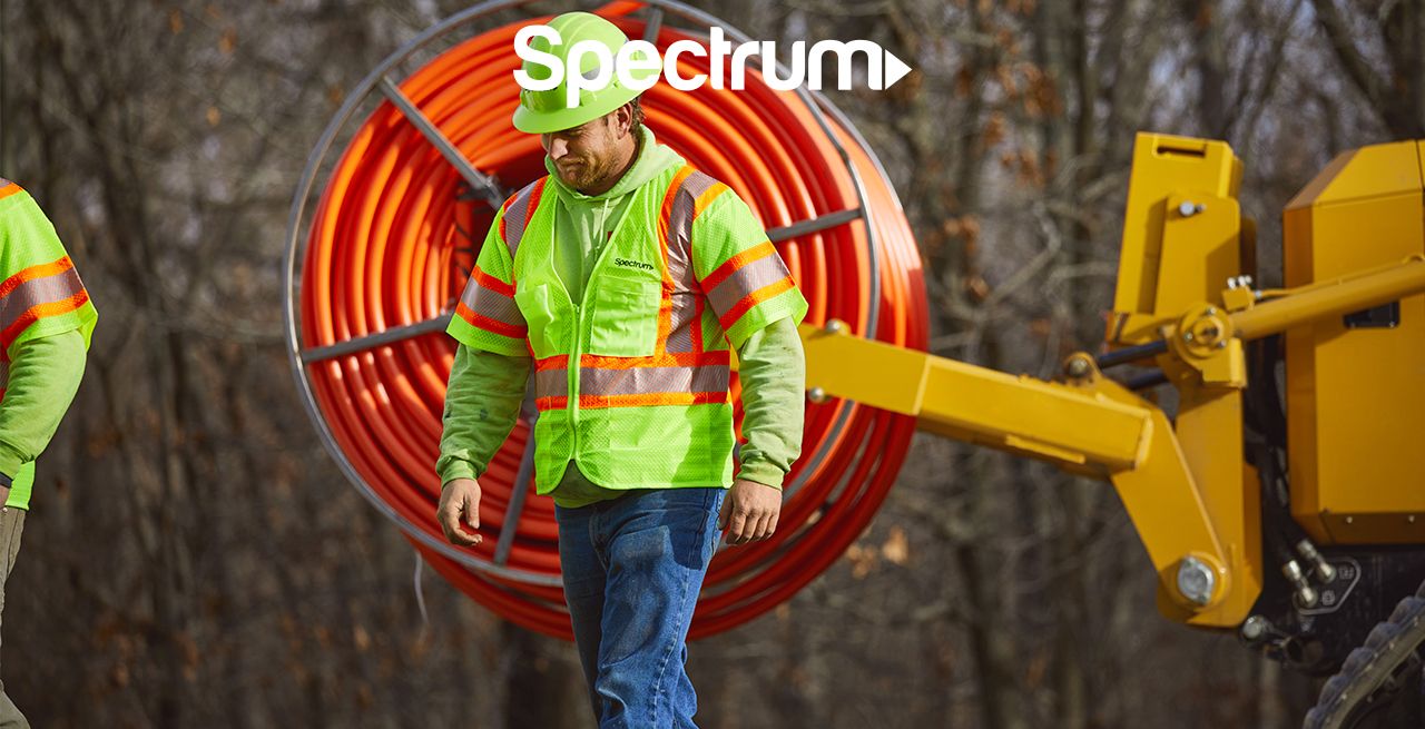 Spectrum technician crew working on broadband expansion project