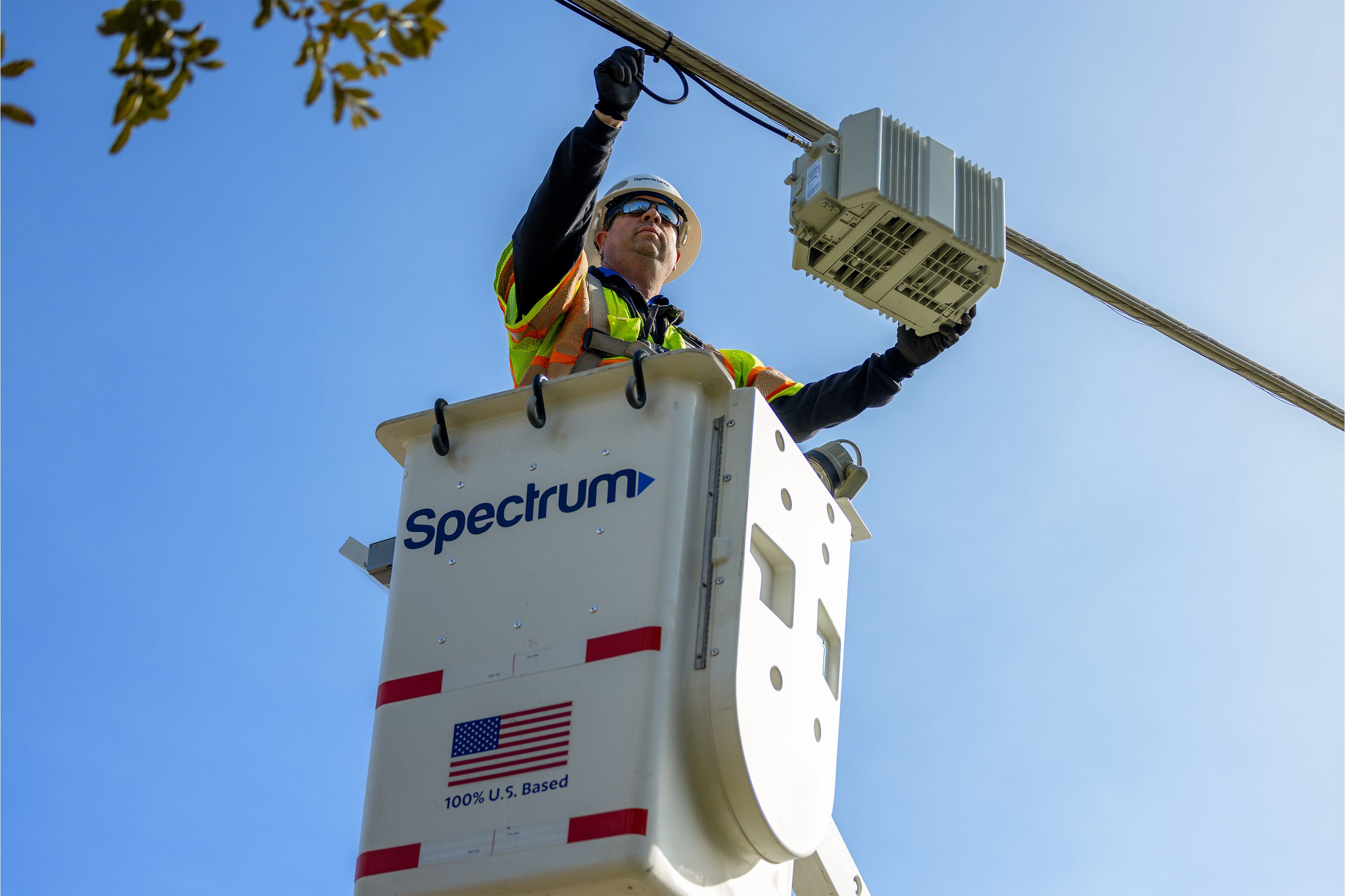 A Spectrum field technician installs a CBRS transceiver